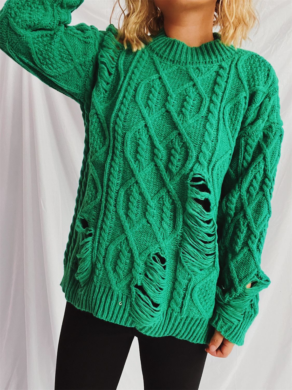 Clara | Long-sleeved, crew-neck, distressed cable-knit sweater