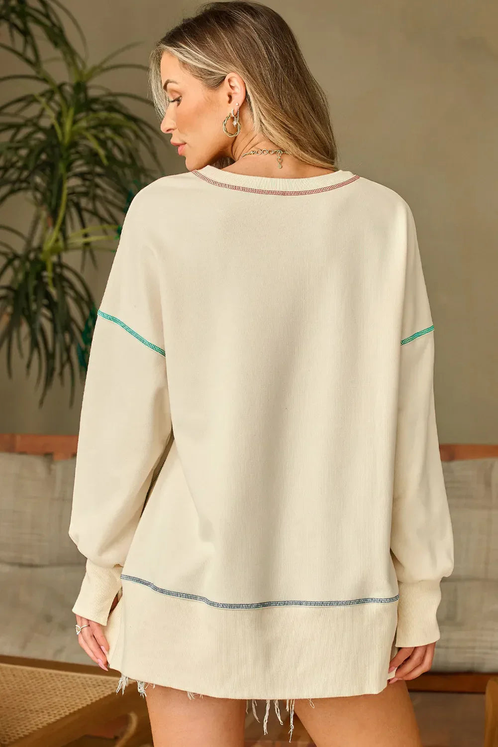 Hilda | Pumpkin crew neck long sleeve sweatshirt with sequins and contrast stitching