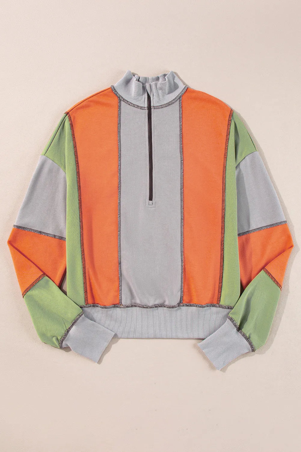 Andrea | Full size long sleeve sweatshirt with exposed seams and color block pattern