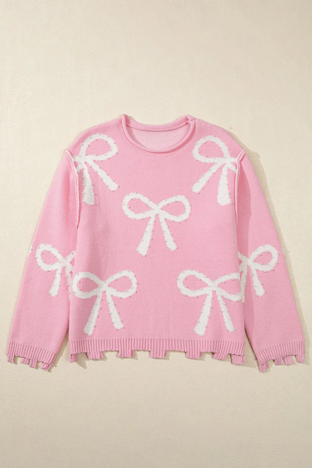Yessica | Long-sleeved crew neck sweater with pearl detail and bow