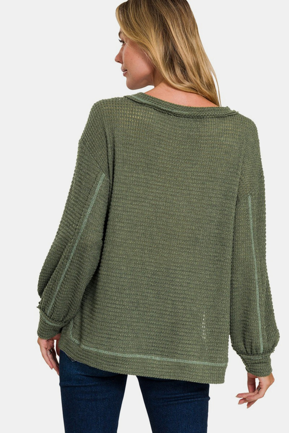 Flavia | Long sleeve top with exposed seam and side slit