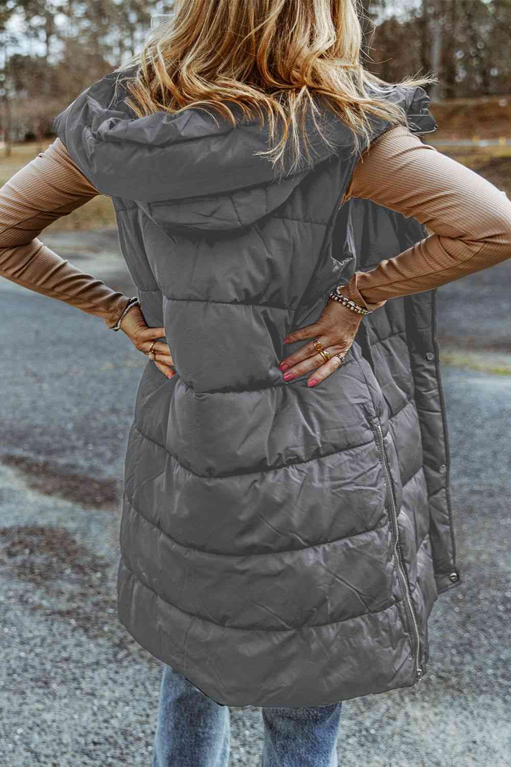 Hortensia | Long, sleeveless, padded hooded coat