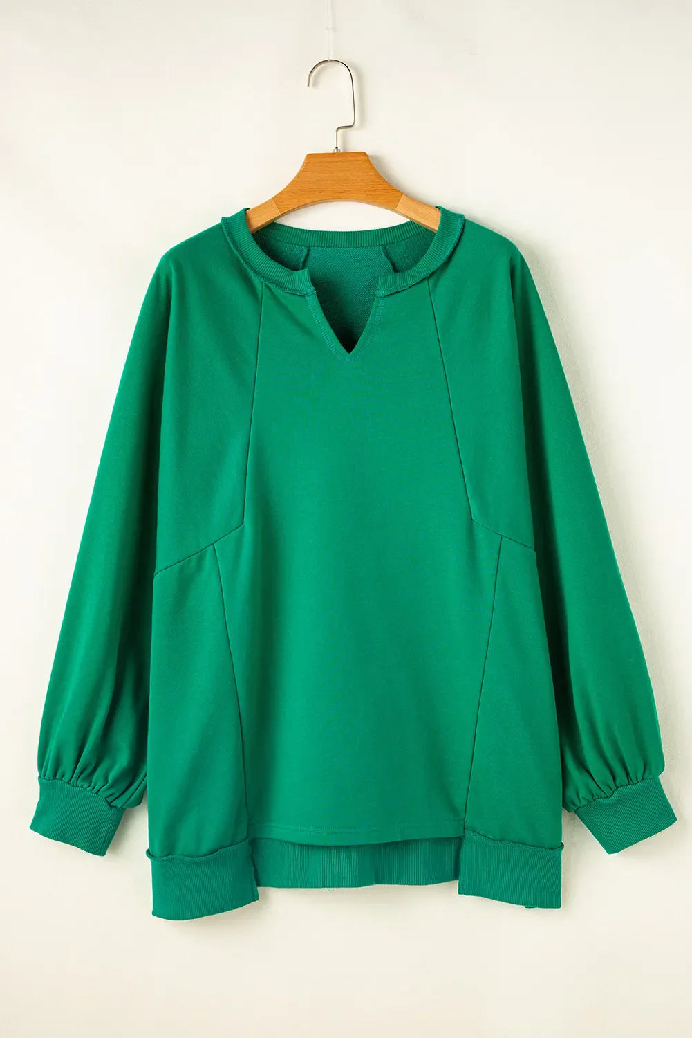 Yvonne | Plus size long sleeve sweatshirt with cutout hem and notched hem