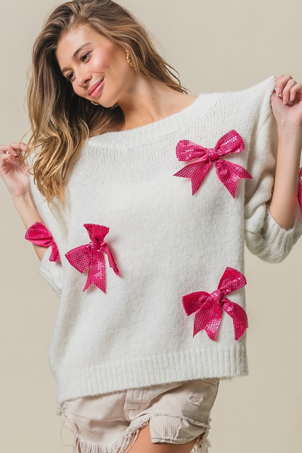Victoria | Jumper with sequin bow and puff sleeves