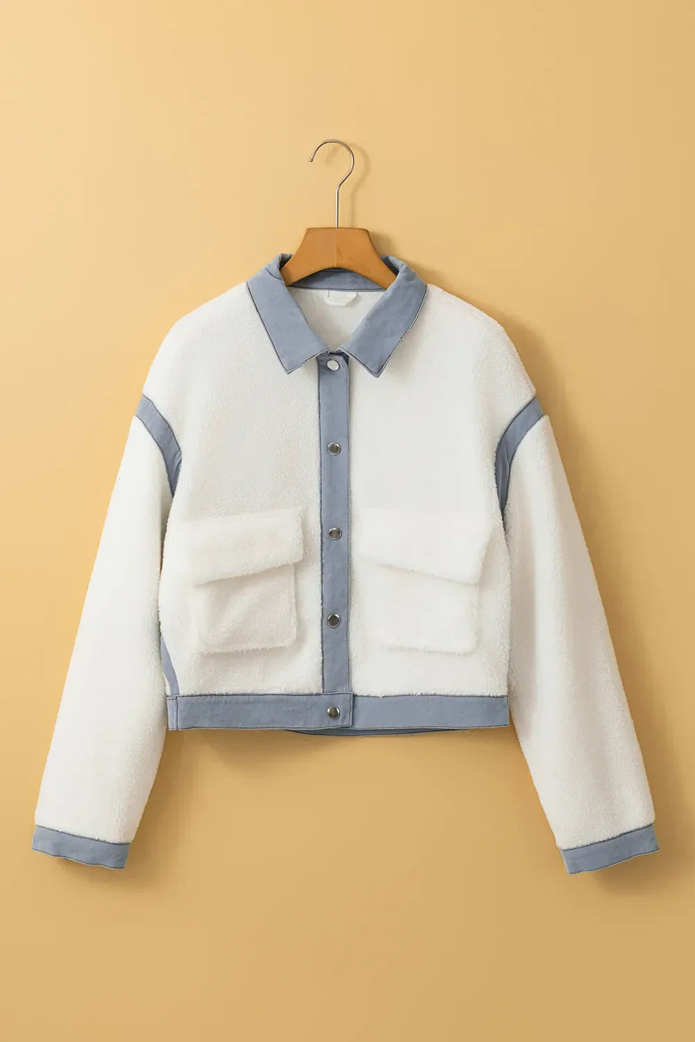 Ilse | Long sleeve jacket with snap closure and splices