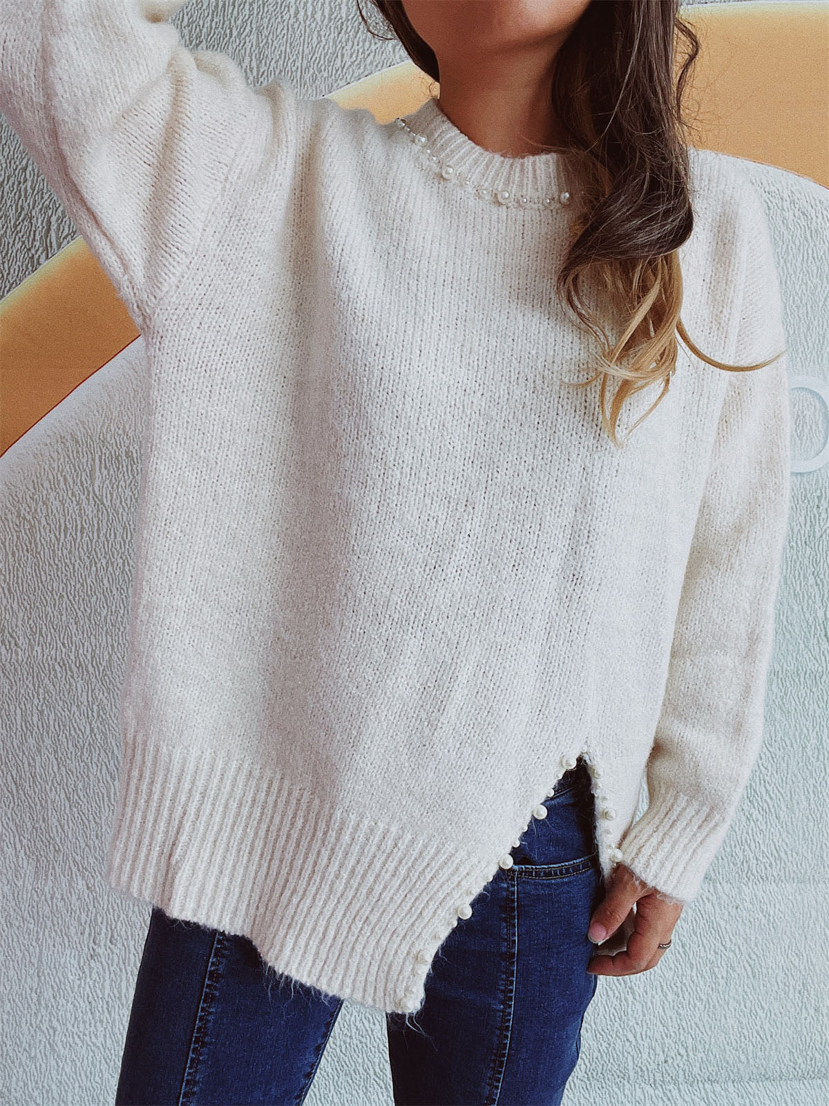 Larissa | Long-sleeved sweater with a slit and beaded trim and a crew neck