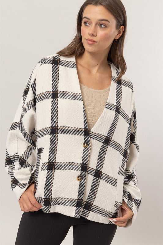 Norma | Checked long-sleeved jacket with side slit pockets