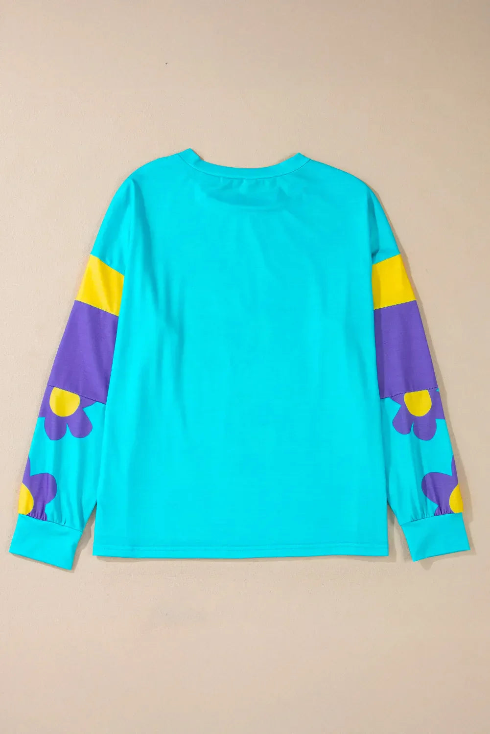 Jana | Long-sleeved blouse with a contrasting floral crew neck