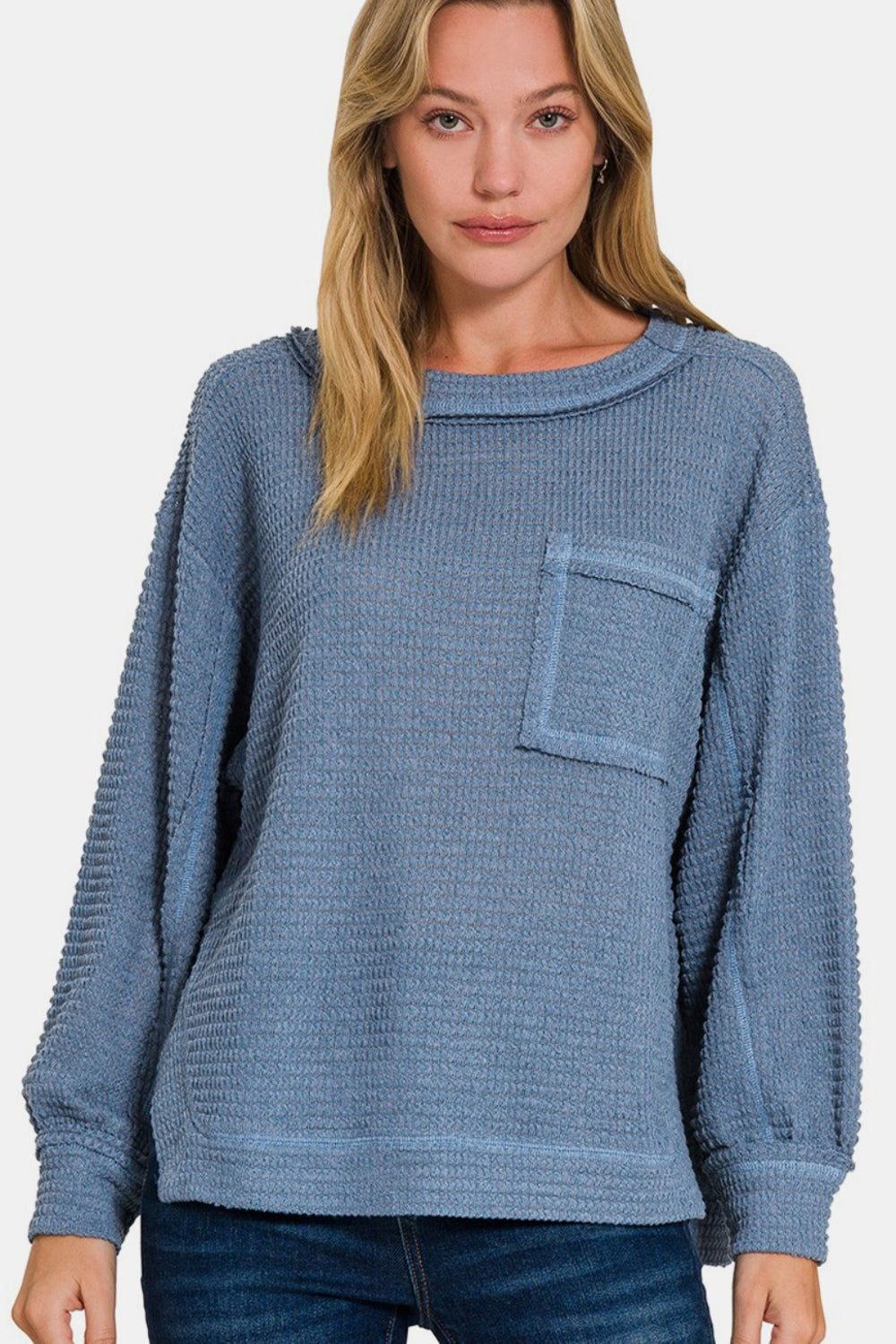 Nerea | Long sleeve top with exposed seam and side slit
