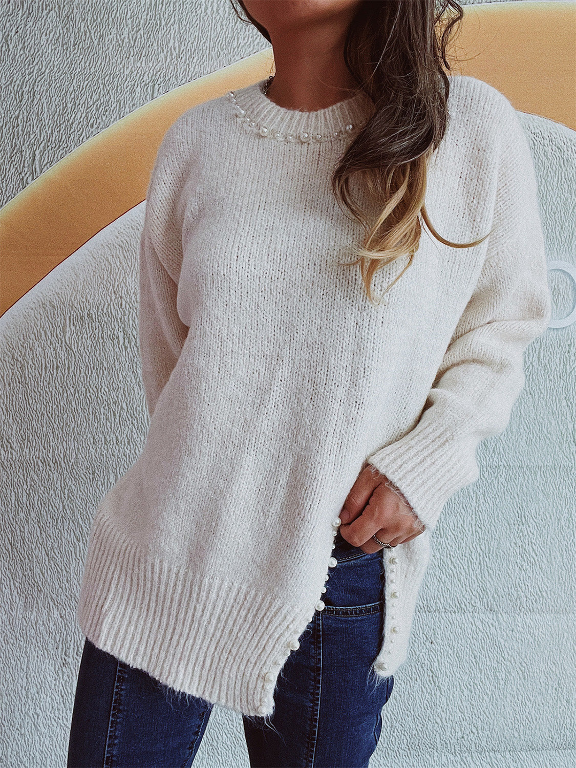 Larissa | Long-sleeved sweater with a slit and beaded trim and a crew neck