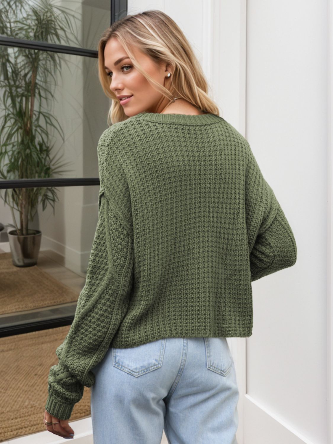 Simona | Cable knit sweater with a crew neck and dropped shoulders