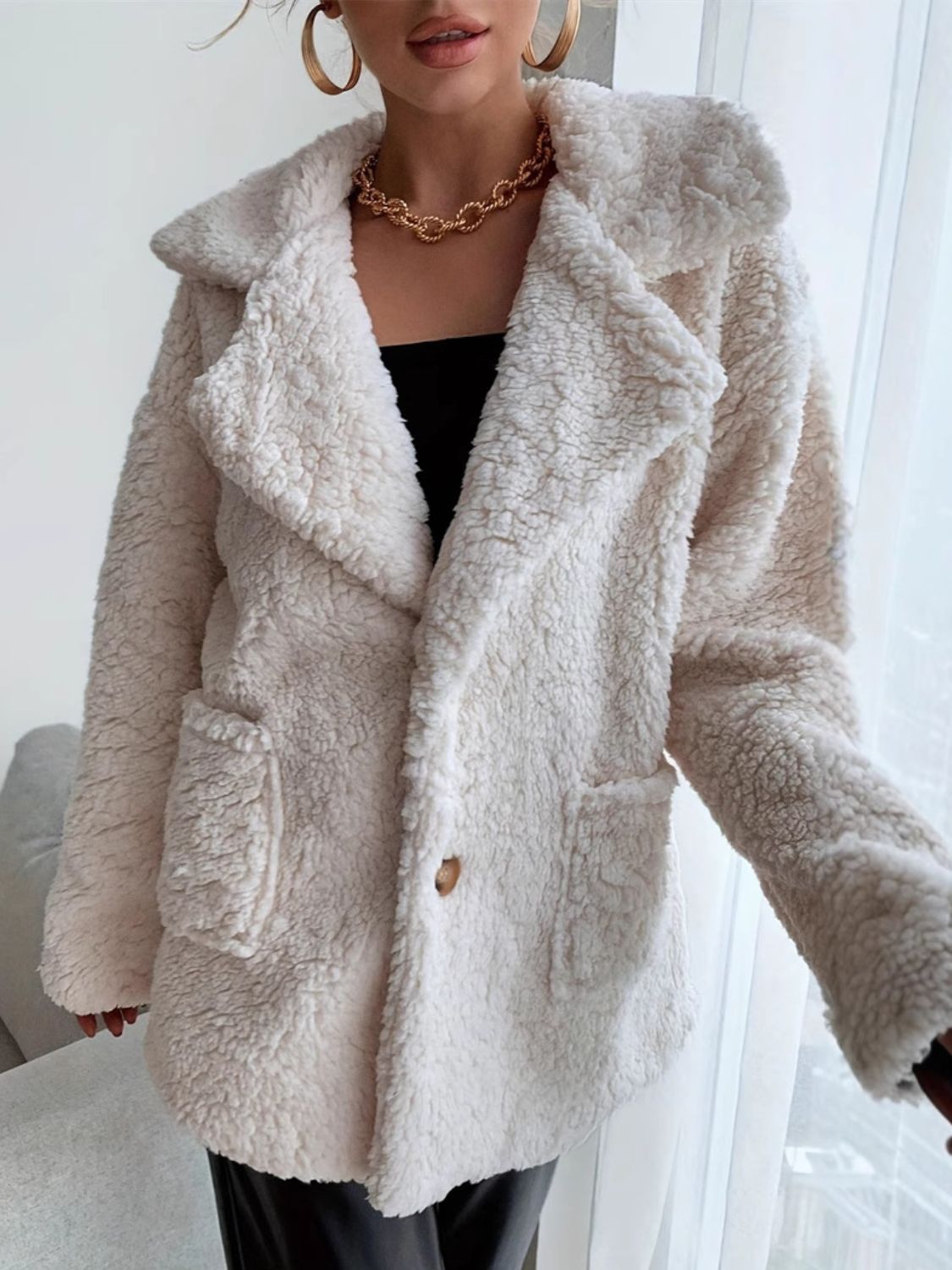 Pink | Fluffy, long-sleeved coat with an open front