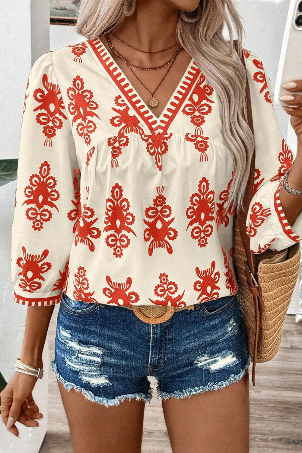 Renata | Printed blouse with three quarter sleeves and V-neck