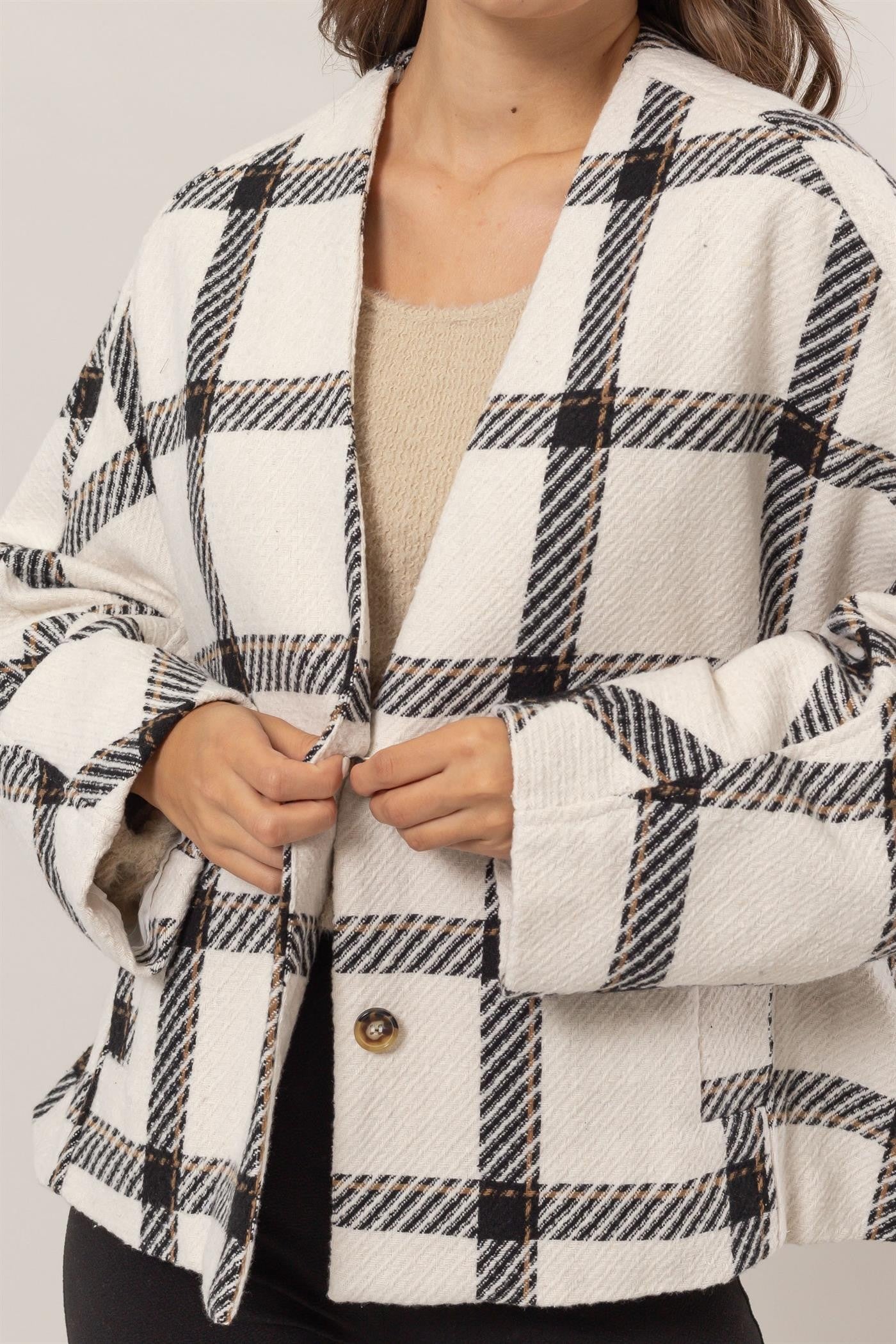 Norma | Checked long-sleeved jacket with side slit pockets