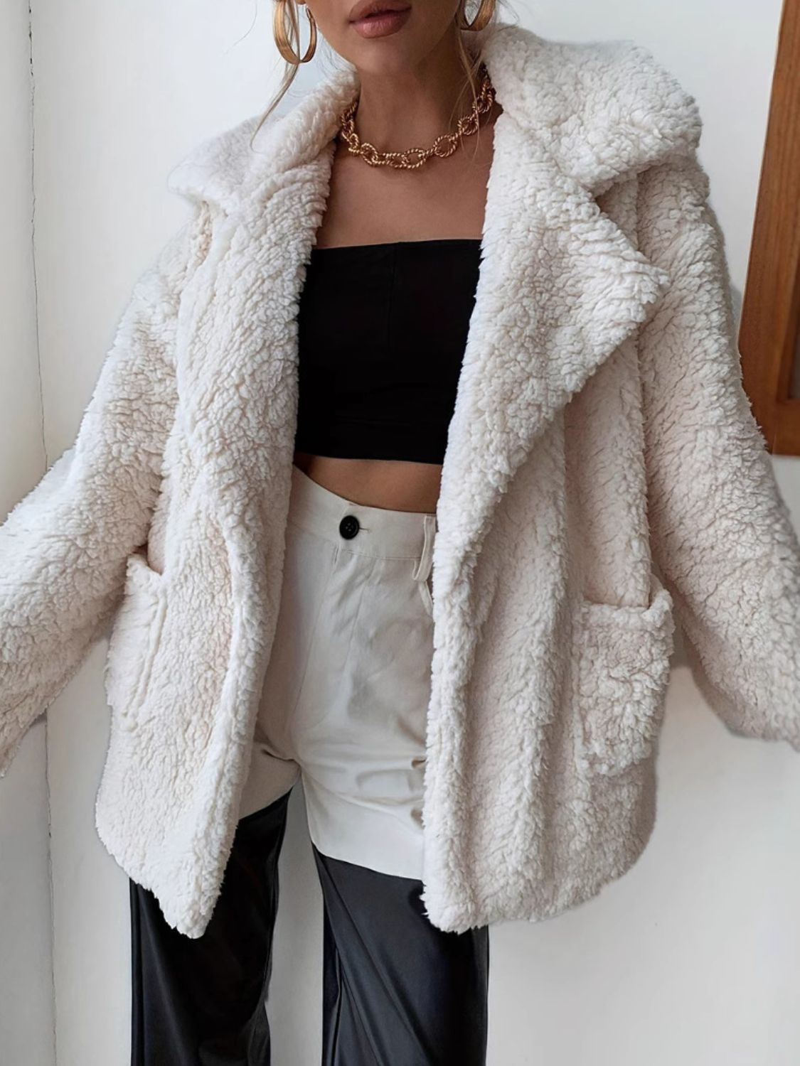 Pink | Fluffy, long-sleeved coat with an open front