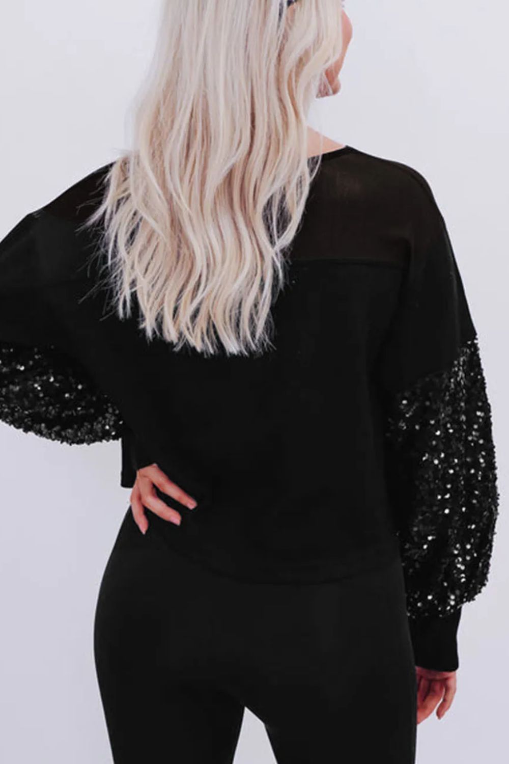 Ingrid | Long-sleeved blouse with sequins and a boat neckline