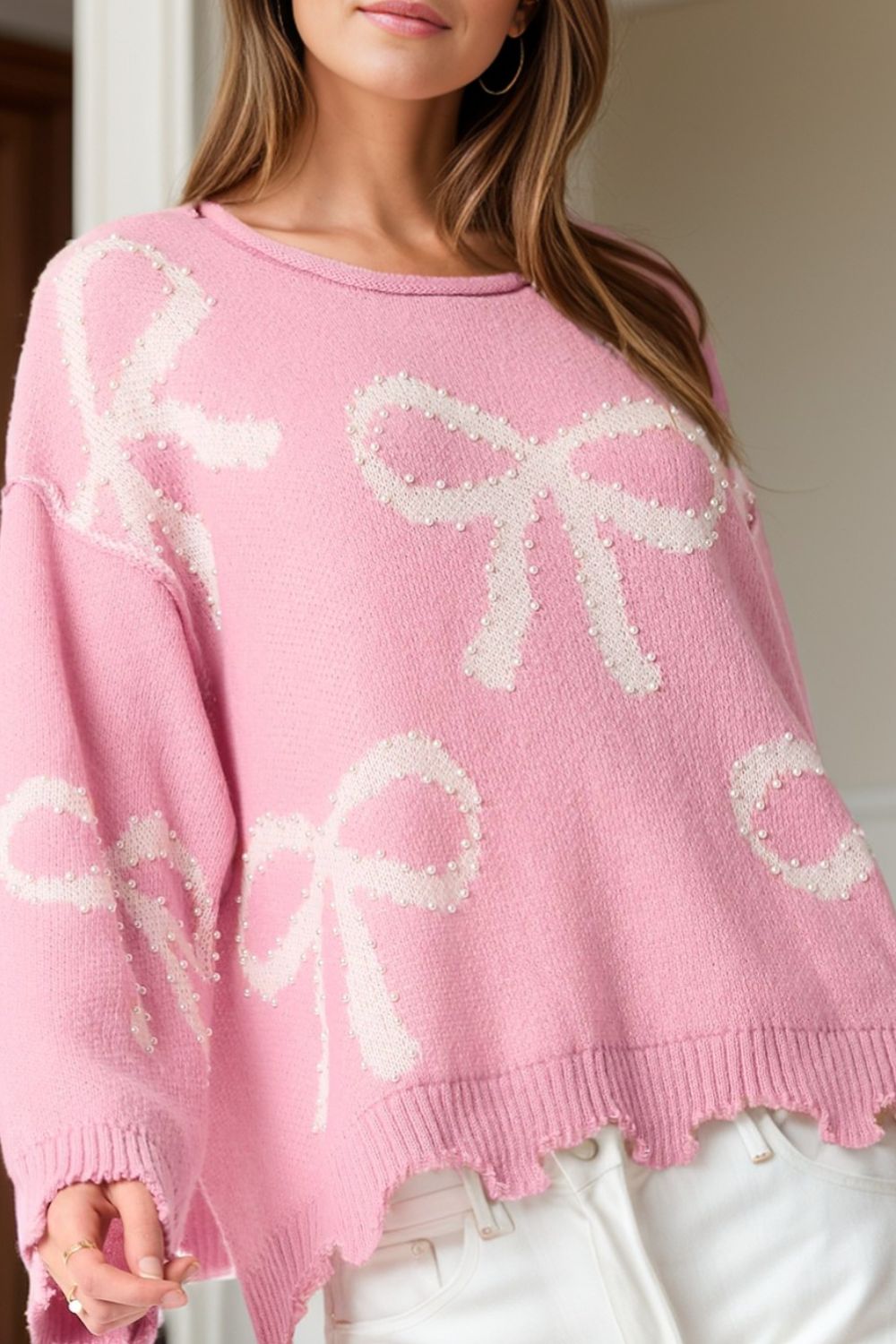 Yessica | Long-sleeved crew neck sweater with pearl detail and bow