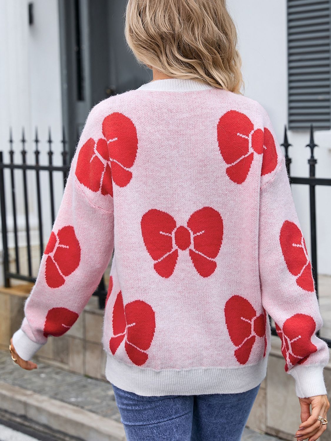 Camila | Round neck sweater with dropped shoulder and bow
