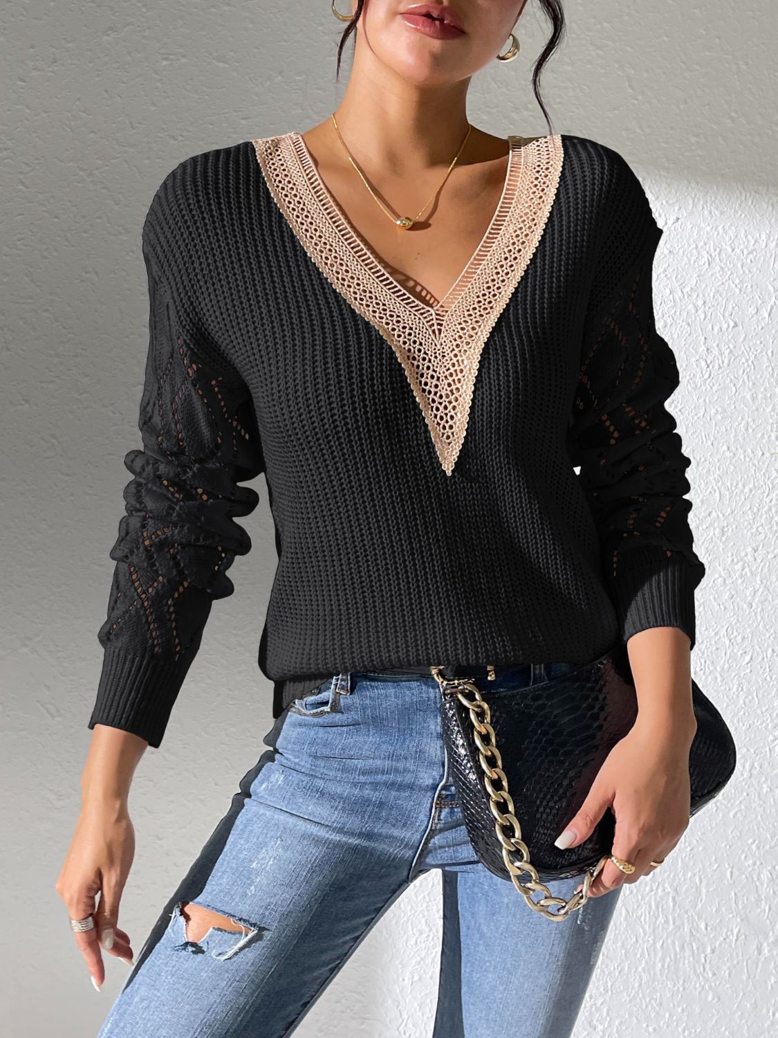 Lucrezia | Openwork sweater with a V-neck and long sleeves
