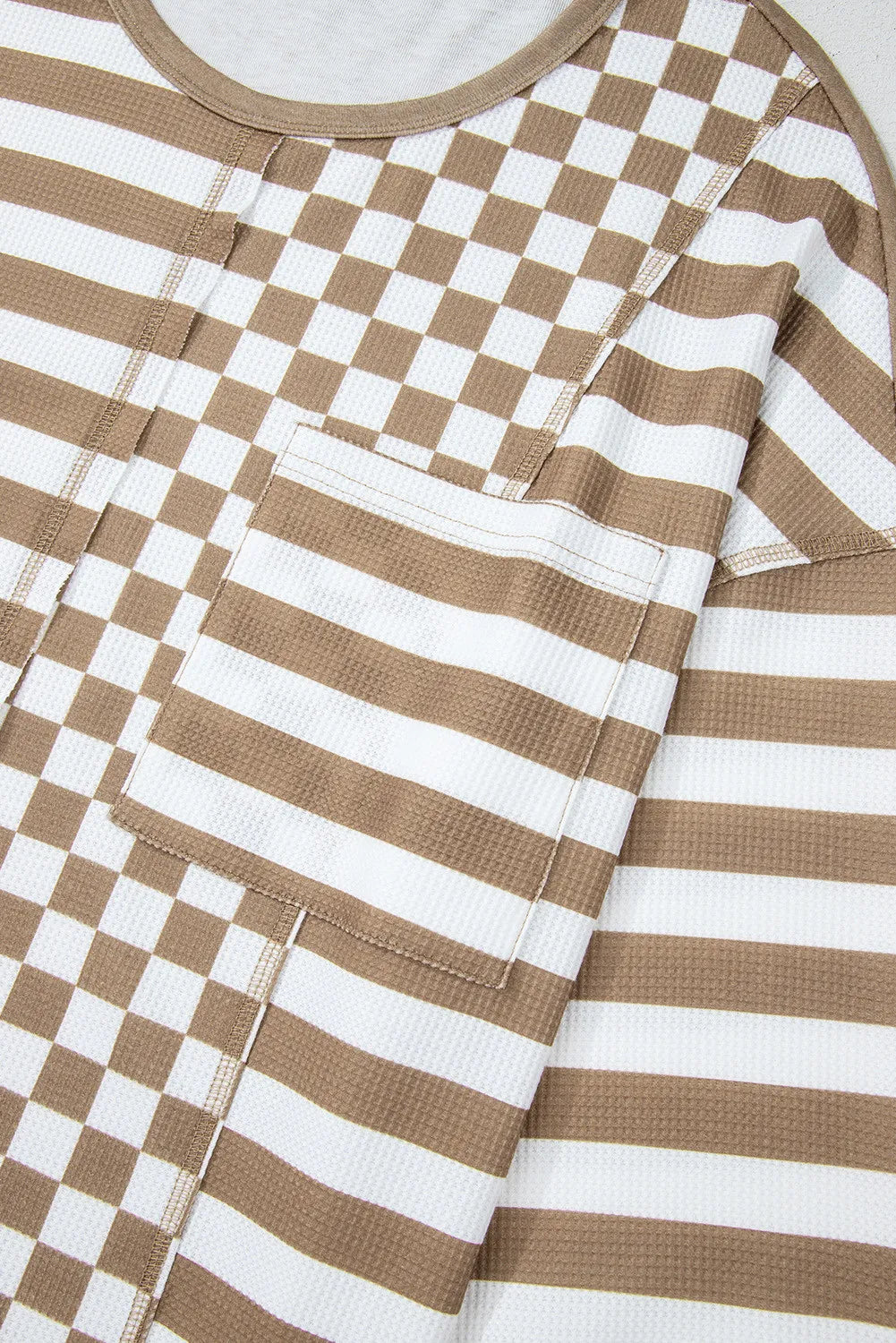 Hannah | Checked and striped long-sleeved blouse with a round neckline
