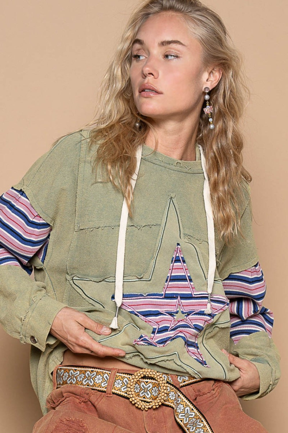 Carla | French terry hoodie with star patchwork and raw edges