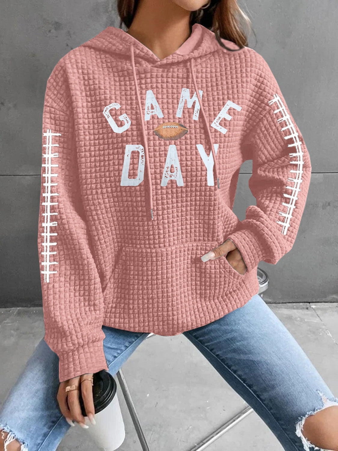 Geraldine | Drawstring football hoodie with long sleeves