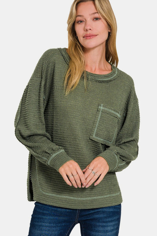 Flavia | Long sleeve top with exposed seam and side slit