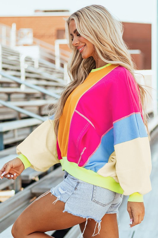 Denise | Women's top with color block patchwork and exposed seams