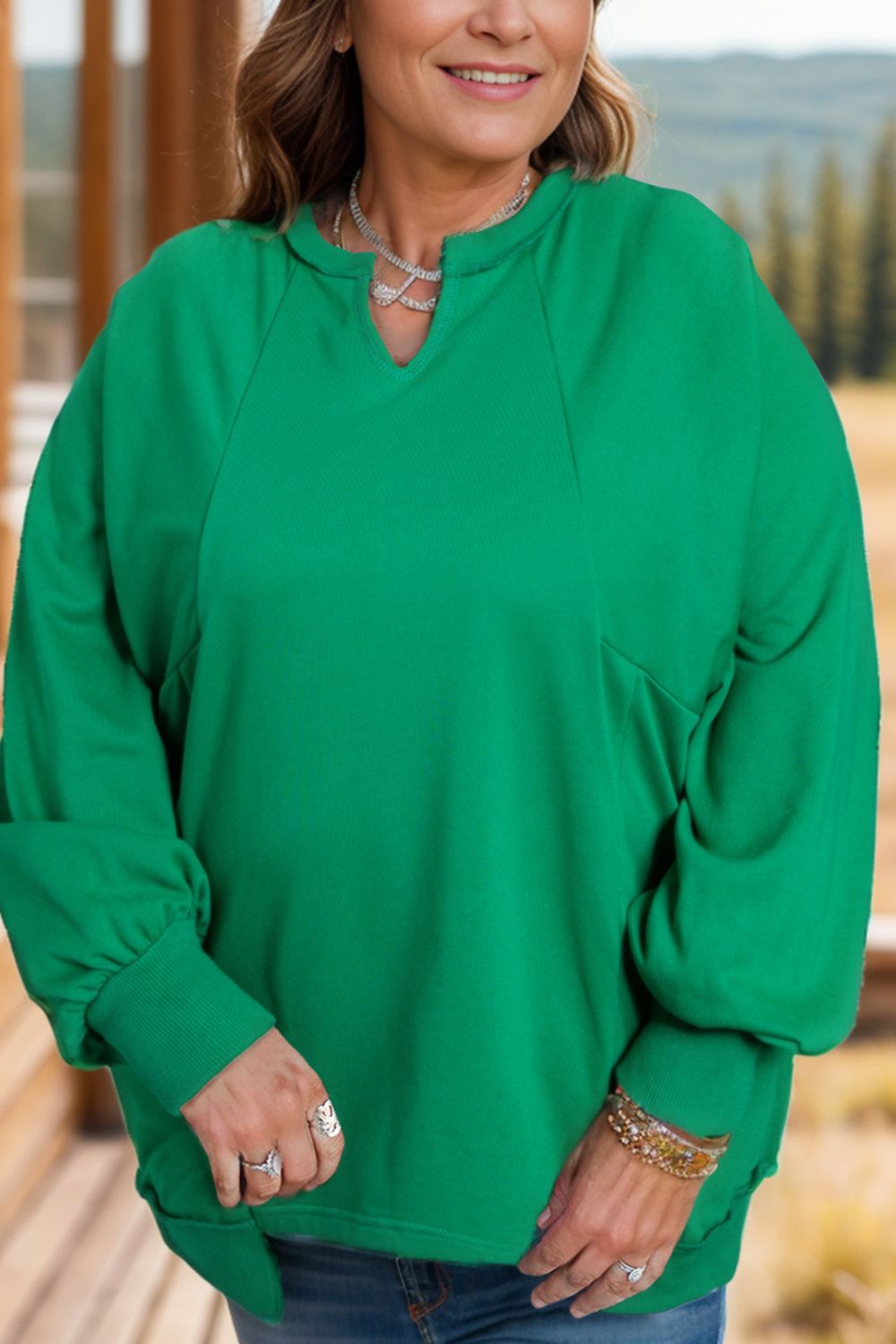 Yvonne | Plus size long sleeve sweatshirt with cutout hem and notched hem
