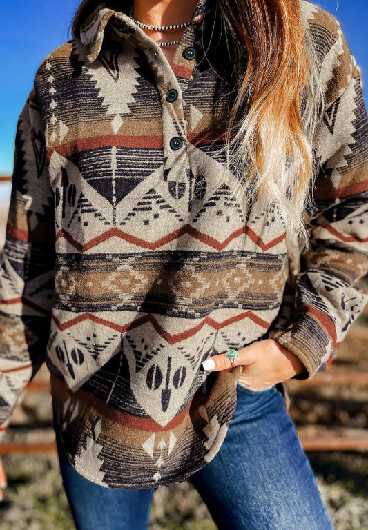 Natividad | Long-sleeved sweatshirt with a geometric half-button pattern