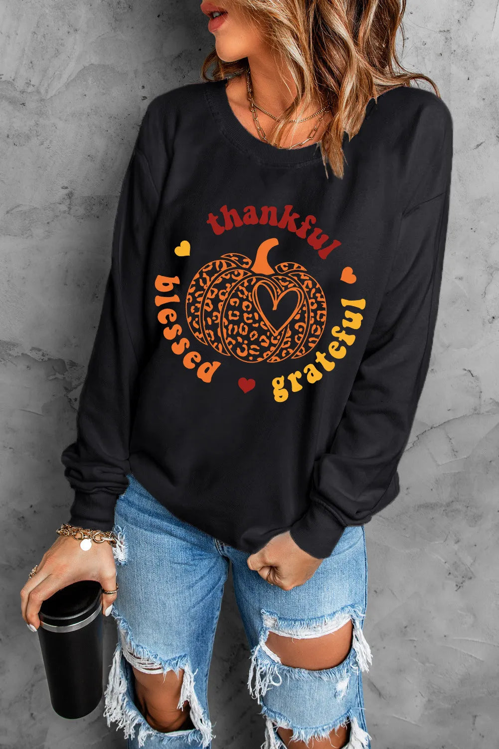 Olga | Long-sleeved sweatshirt with a pumpkin graphic