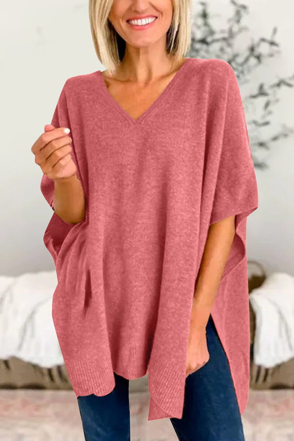 Erika | Slit knit top with V-neck and half sleeves