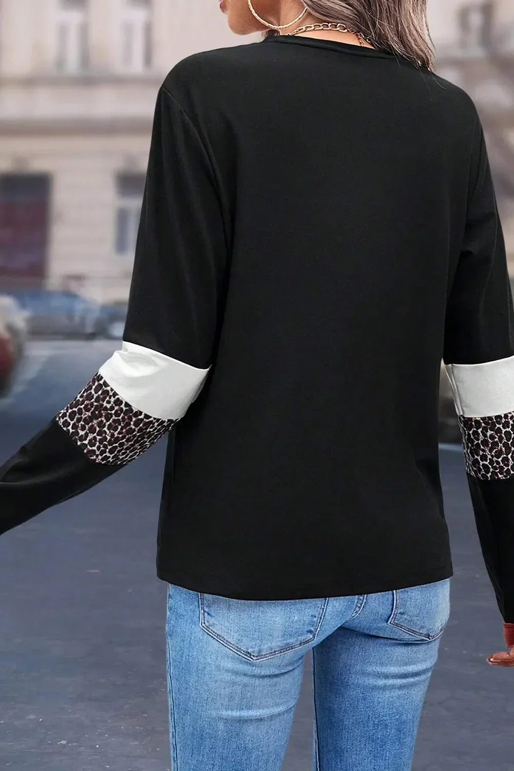 Sabine | Leopard long sleeve blouse with a round neckline