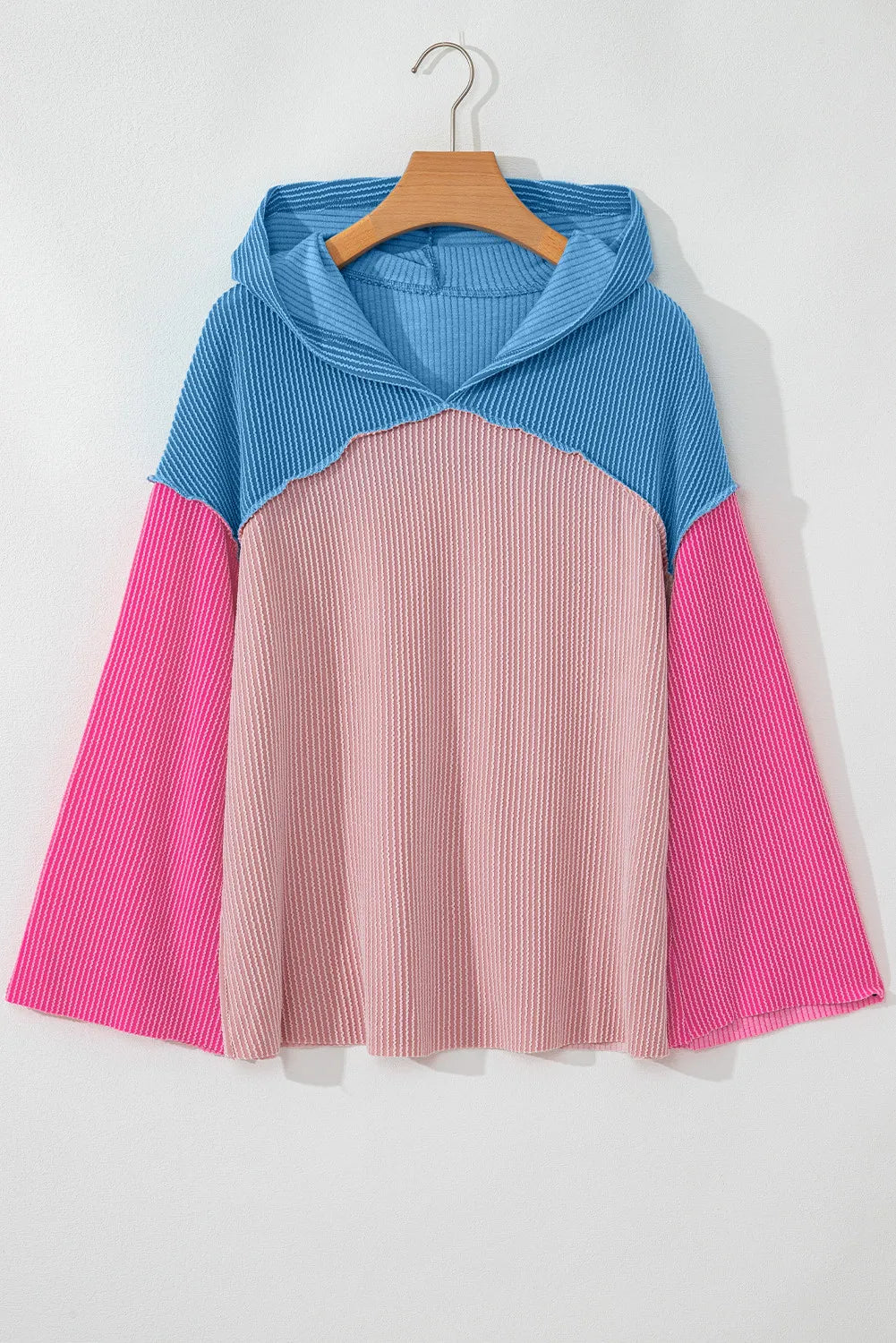 Greta | Long sleeve hoodie with a textured color block design