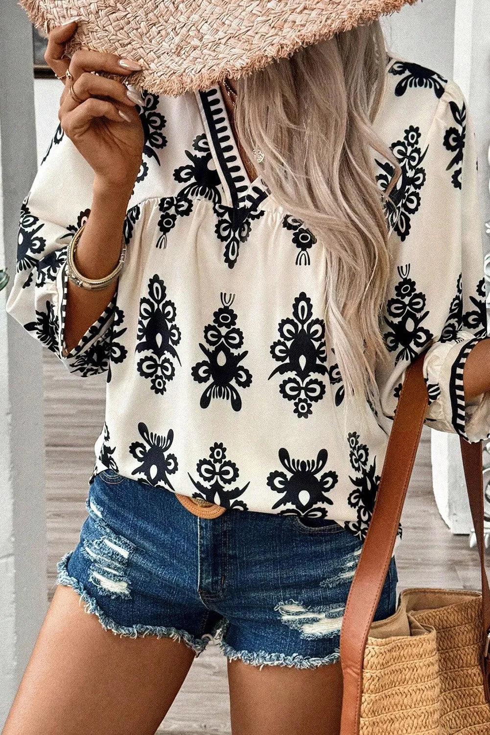 Renata | Printed blouse with three quarter sleeves and V-neck