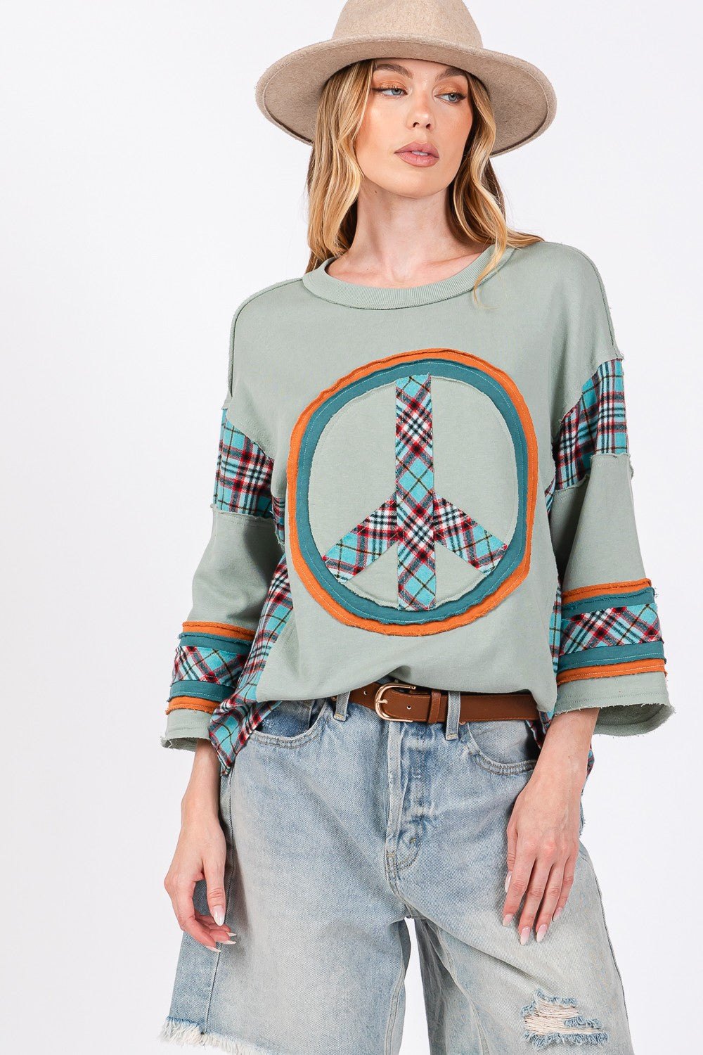 Ariana | SAGE + FIG top with peace appliqué patch and contrast check
