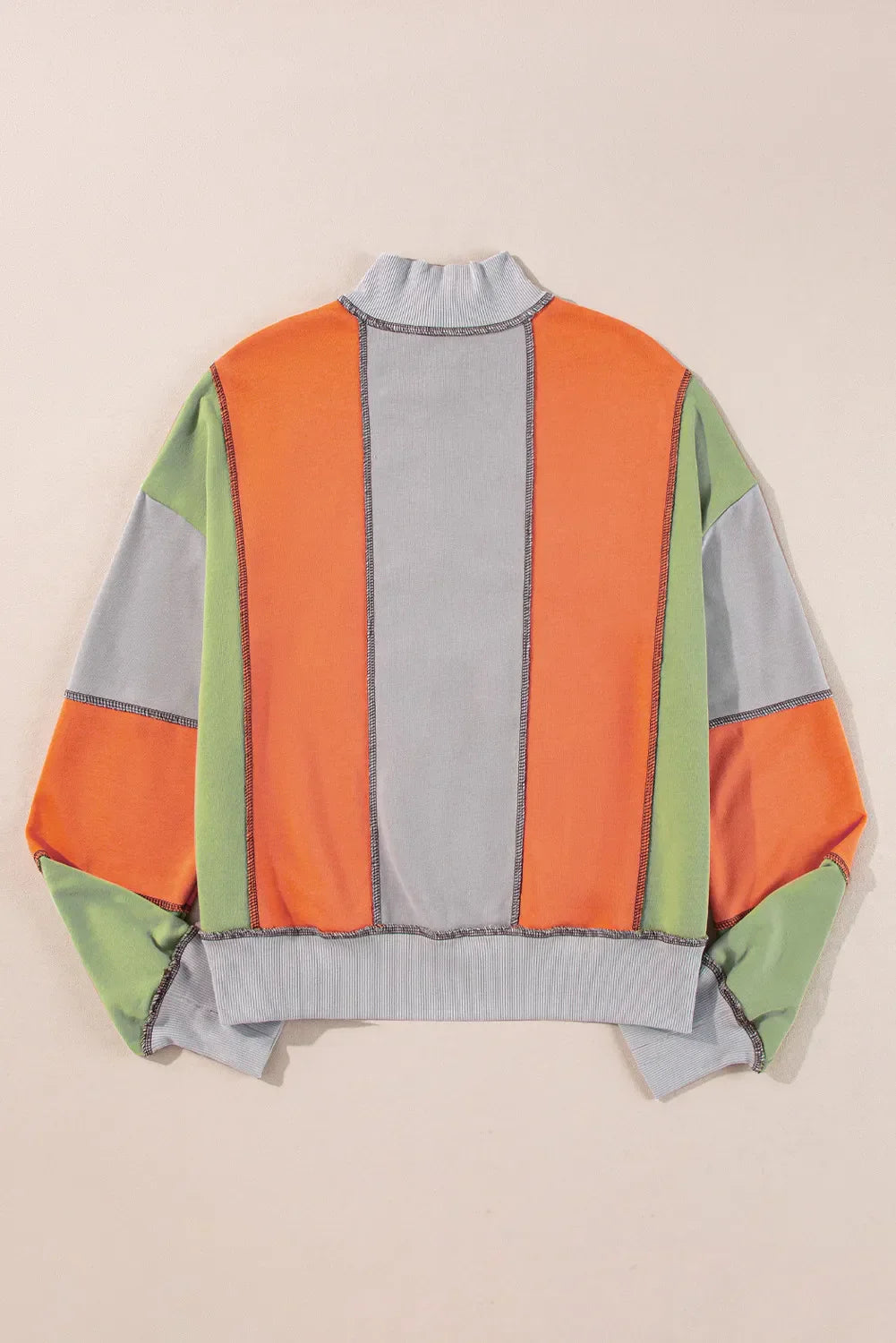 Andrea | Full size long sleeve sweatshirt with exposed seams and color block pattern