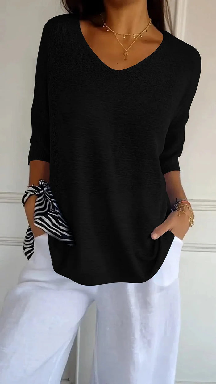 Delia® | Comfortable V-Neck Blouse With A Loose Fit. Casual, Loose-Fitting Top With Half-Length Sleeves.