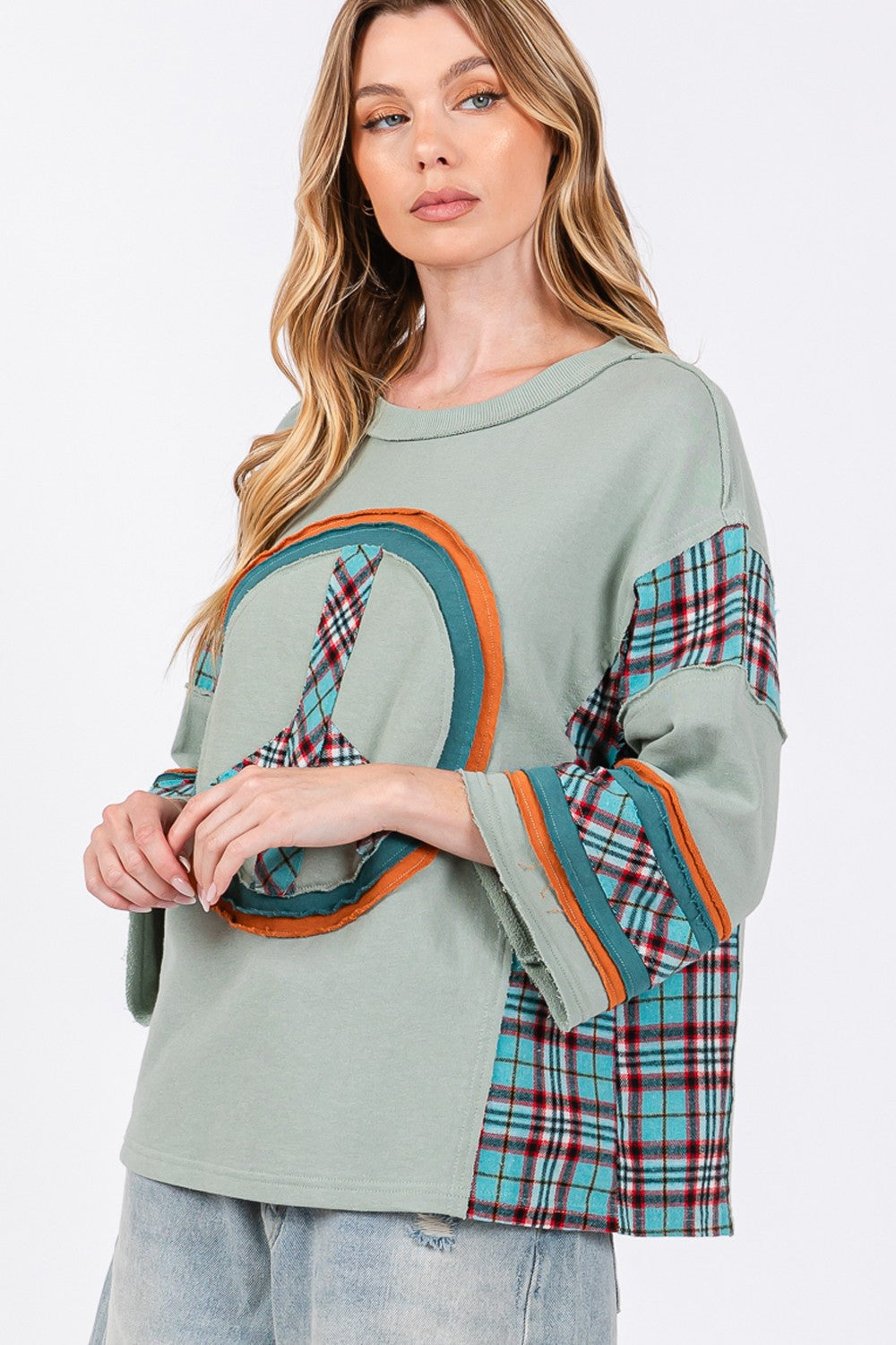 Ariana | SAGE + FIG top with peace appliqué patch and contrast check