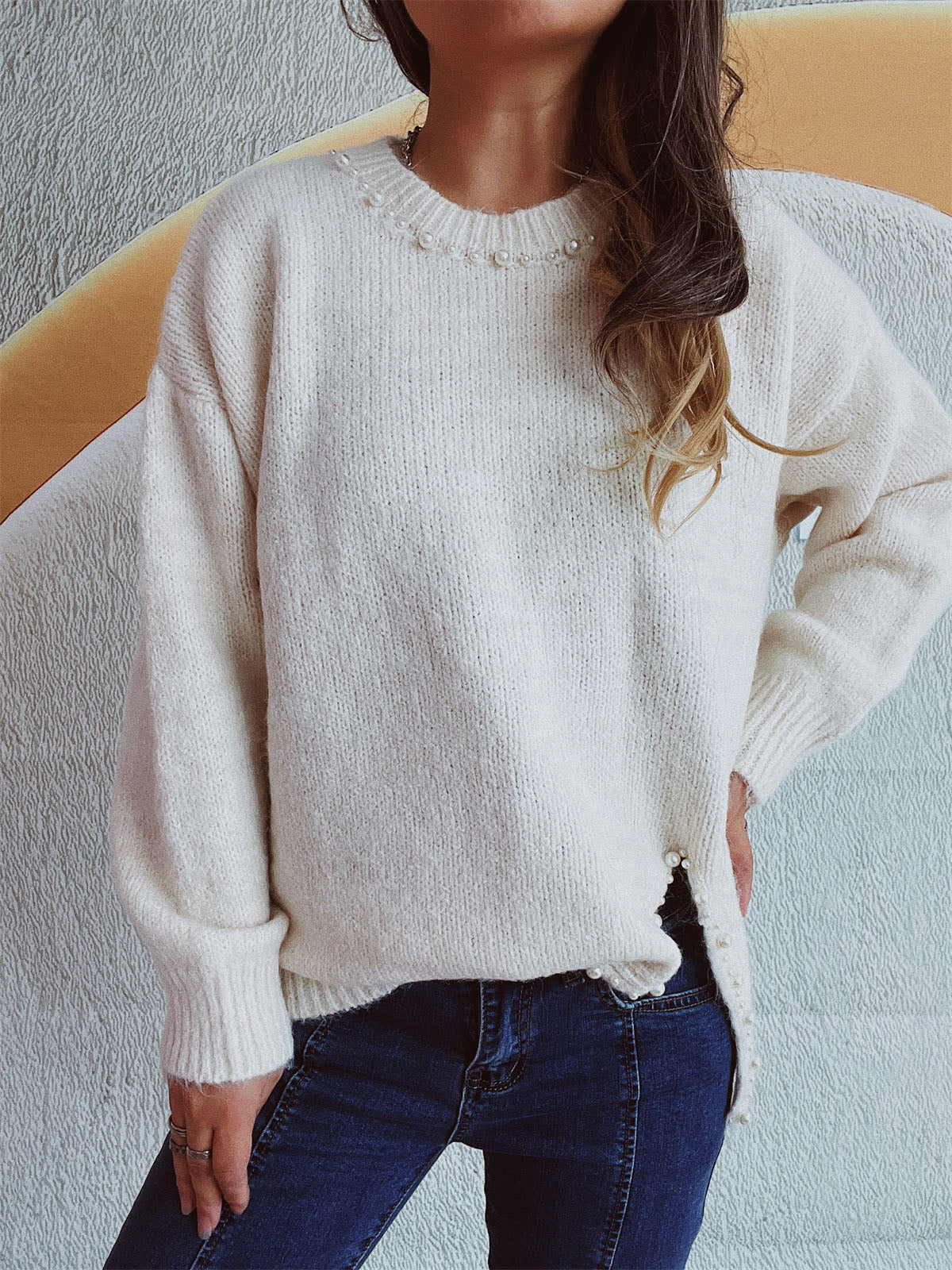 Larissa | Long-sleeved sweater with a slit and beaded trim and a crew neck