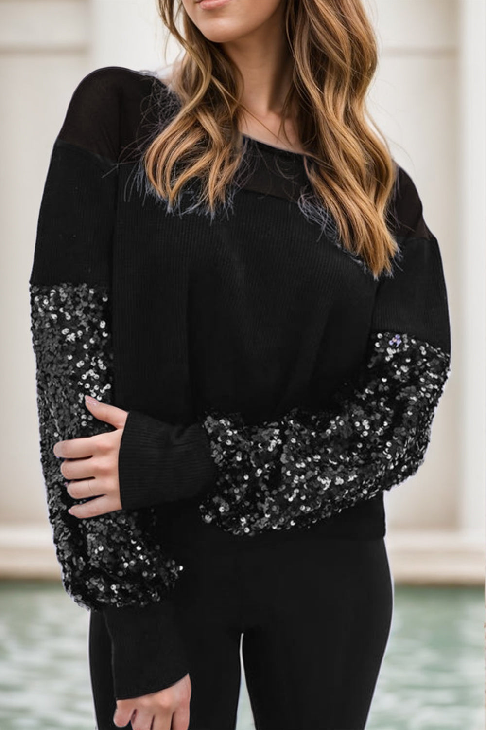 Ingrid | Long-sleeved blouse with sequins and a boat neckline