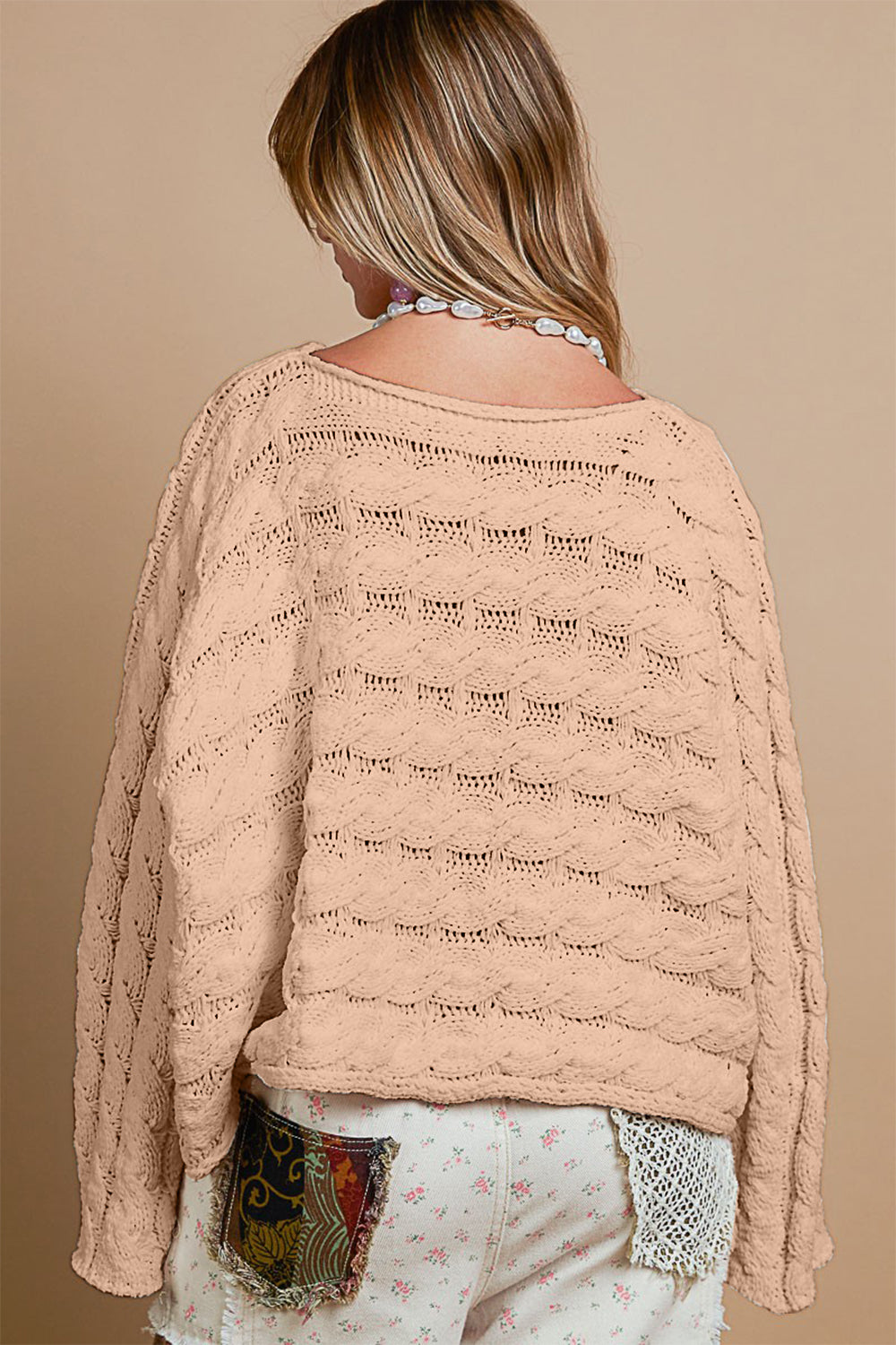 Solveig | Short sweater with a crew neck and cable knit