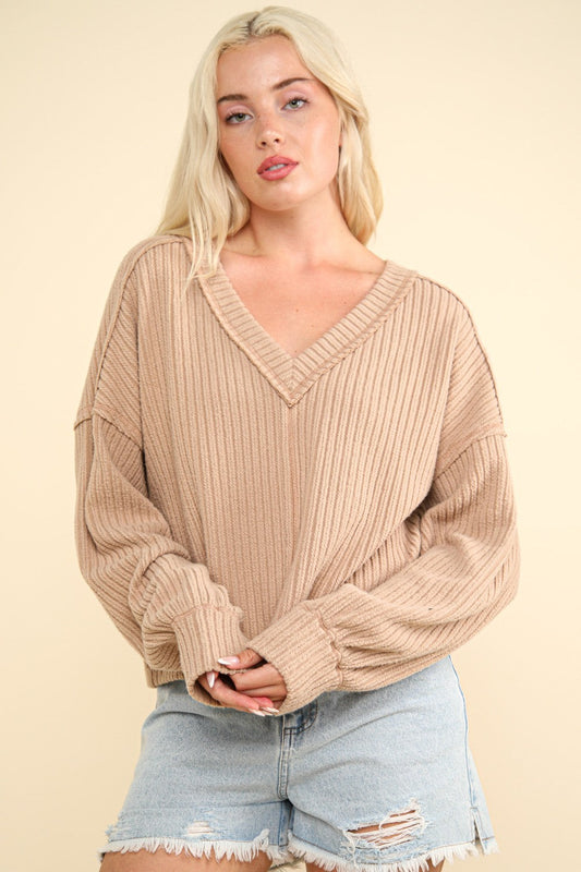 Hilda | Ribbed knit top with exposed seam and V-neck