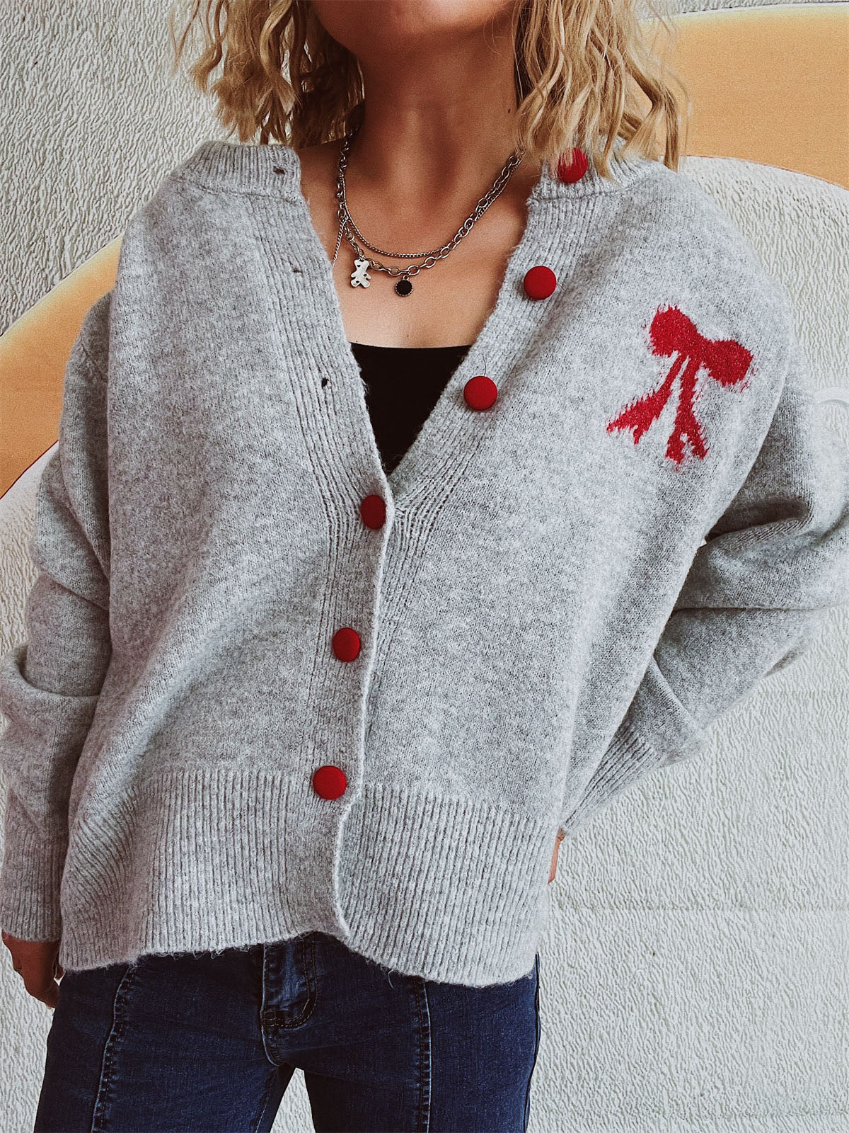 Beate | Long-sleeved cardigan with bow and round neckline and buttons