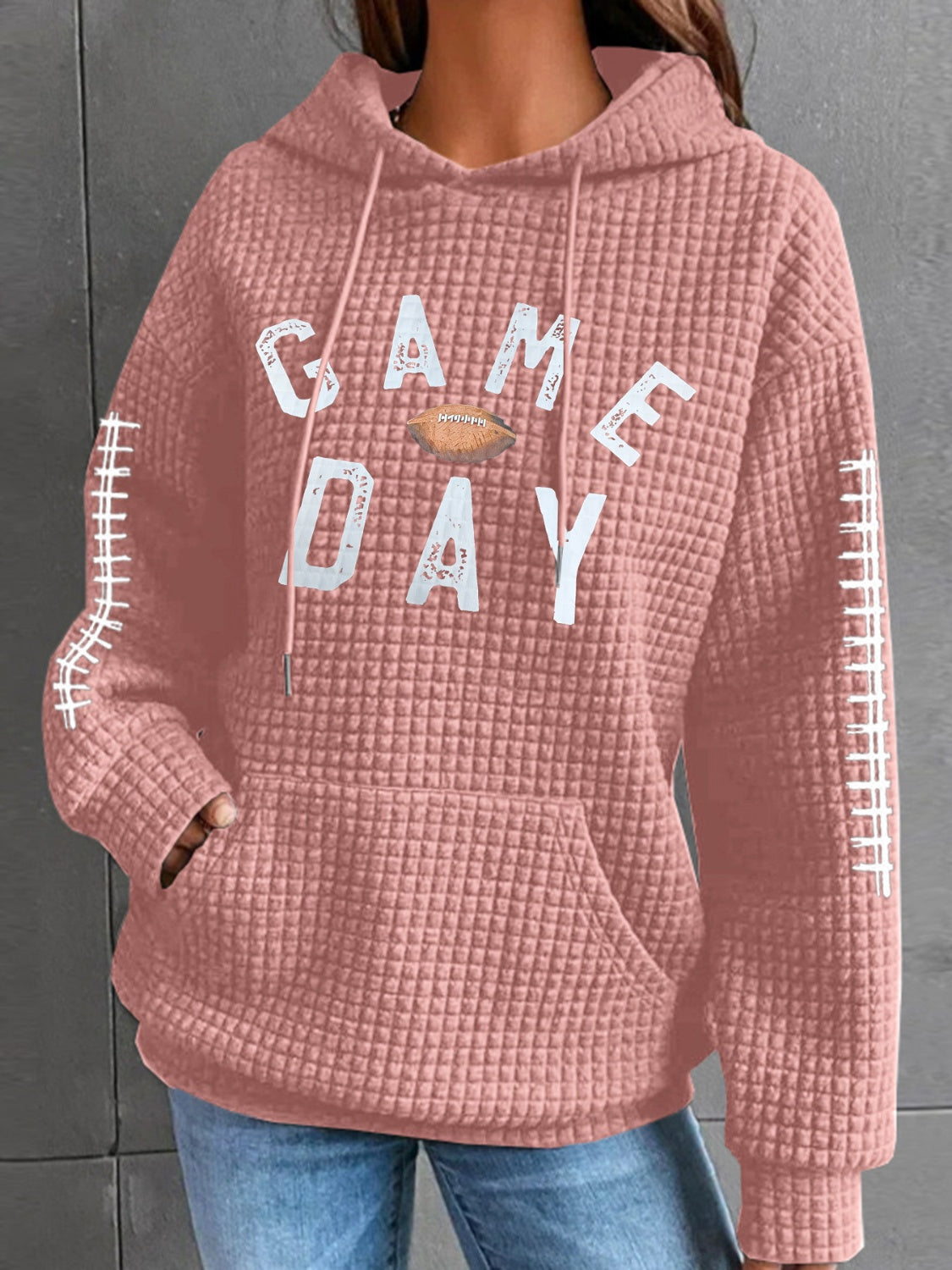 Geraldine | Drawstring football hoodie with long sleeves