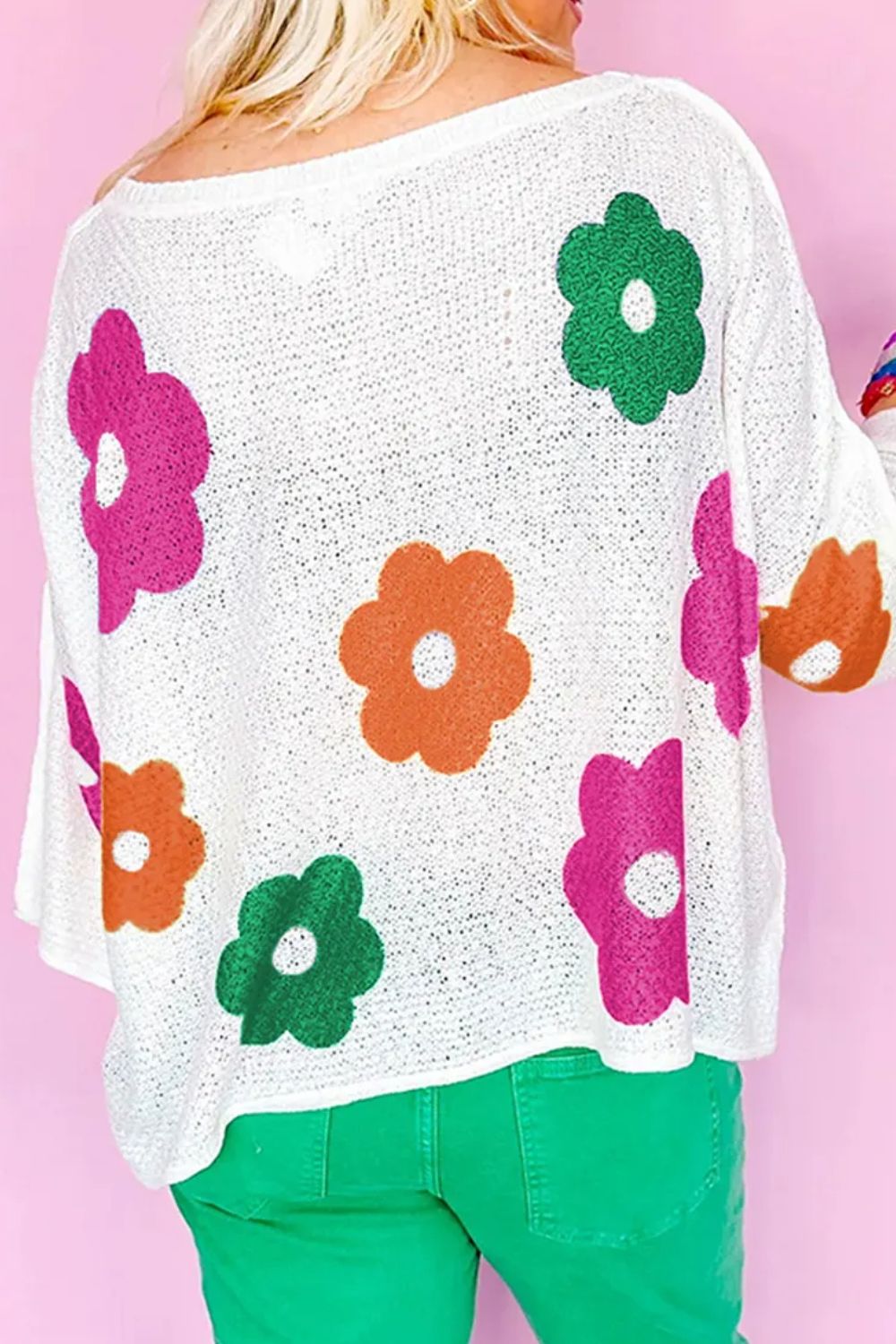 Delia | Floral knit top with a crew neck and quarter buttons