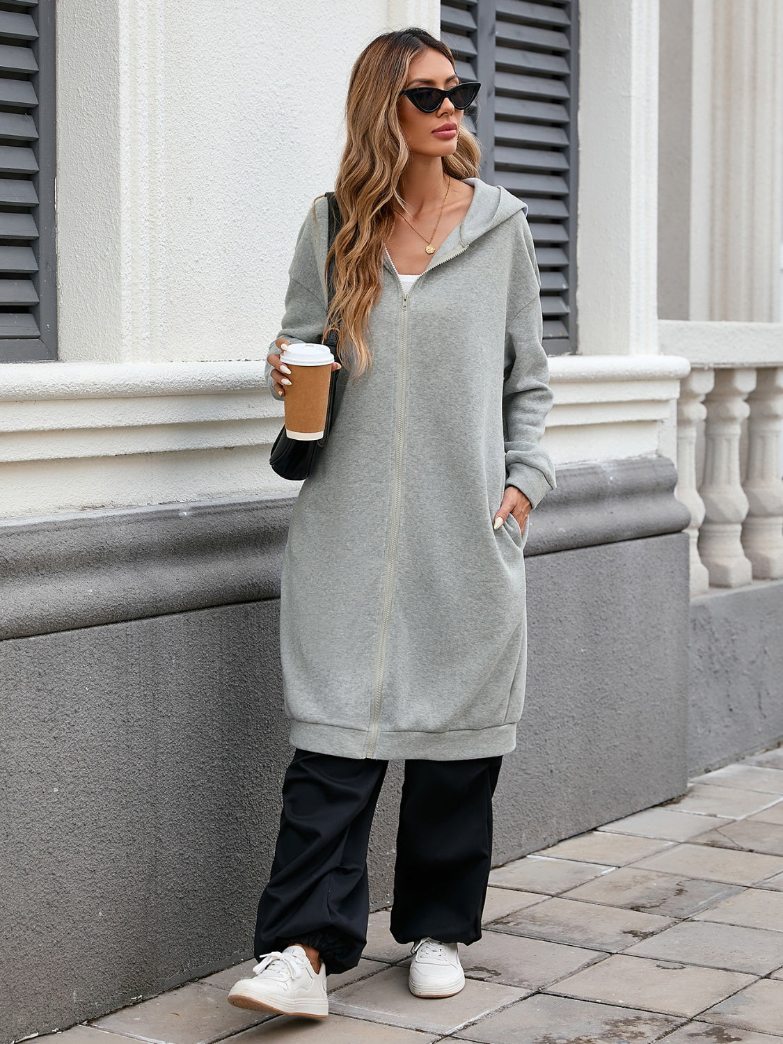 Hedwig | Long sleeve outerwear with hood and zip fastening