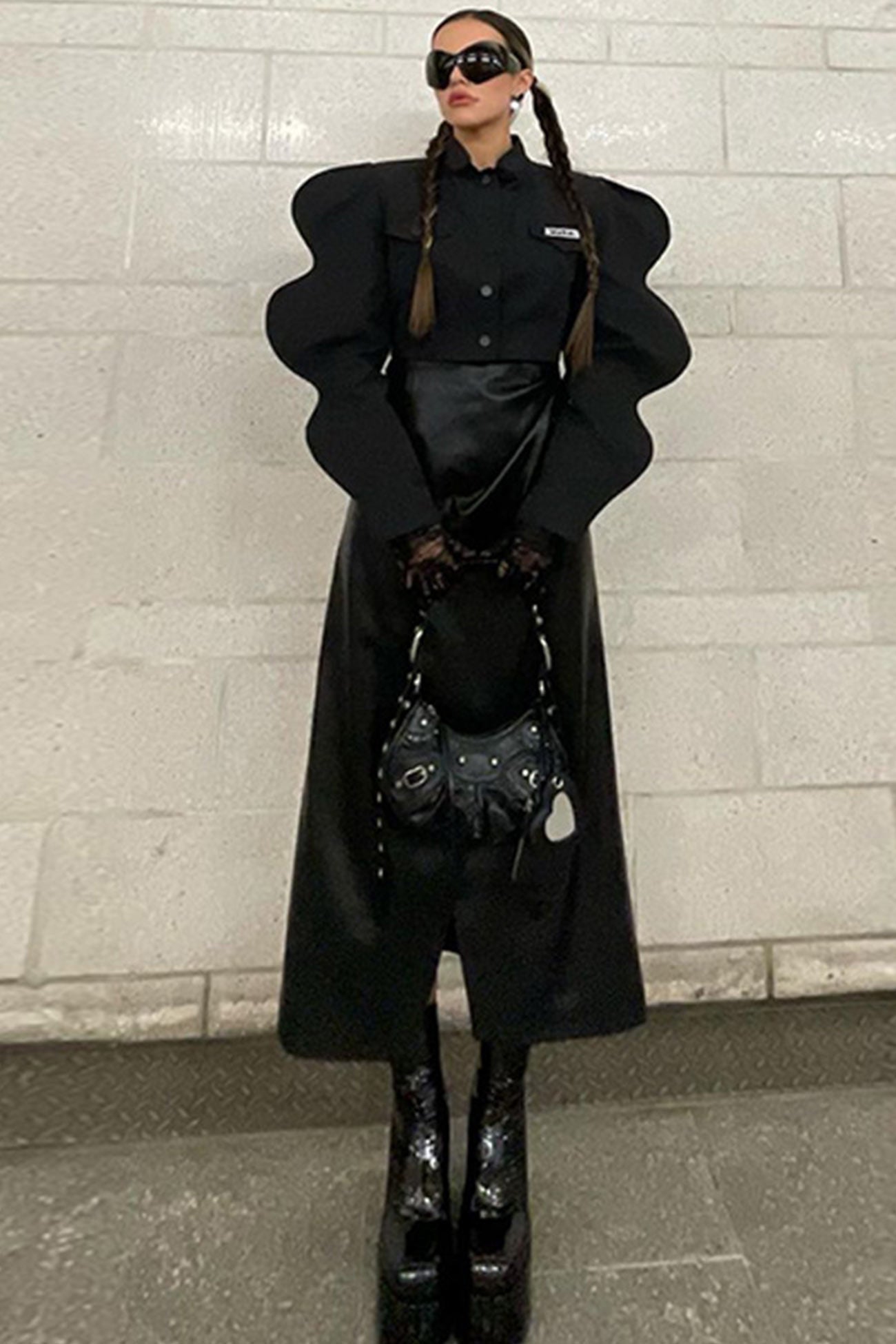 Sandra | Black coat with irregular sleeves and front lapel button