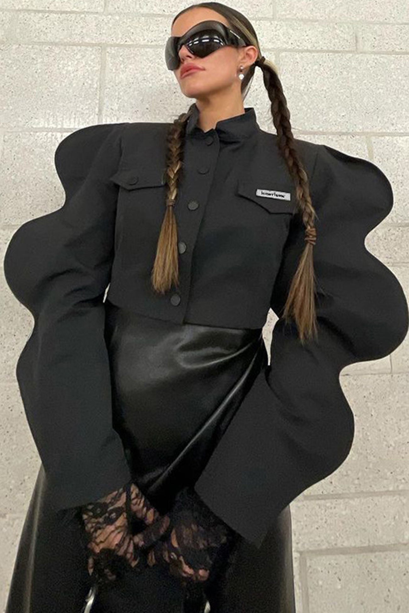 Sandra | Black coat with irregular sleeves and front lapel button