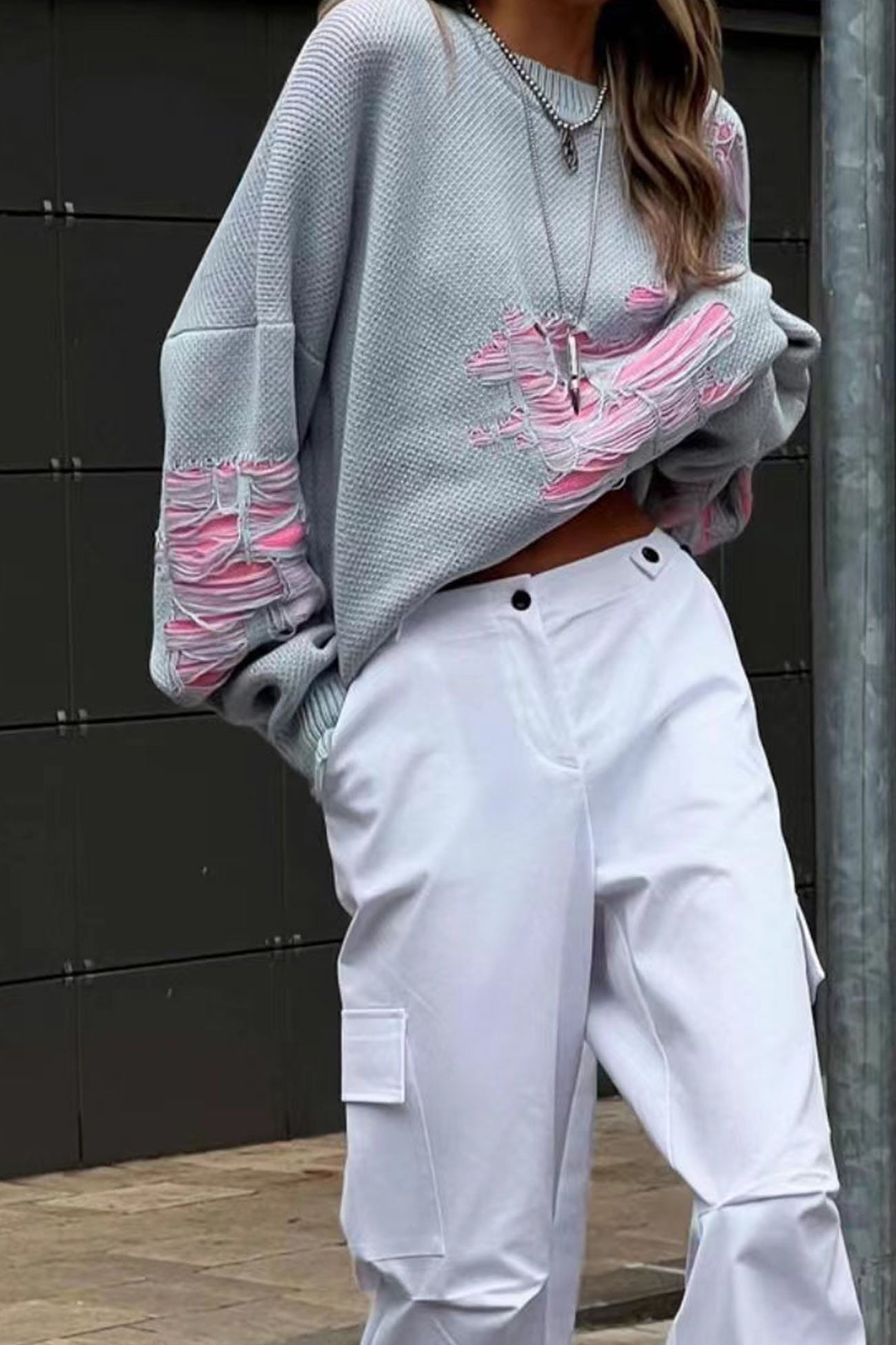 Monique | Contrast sweater with a distressed look